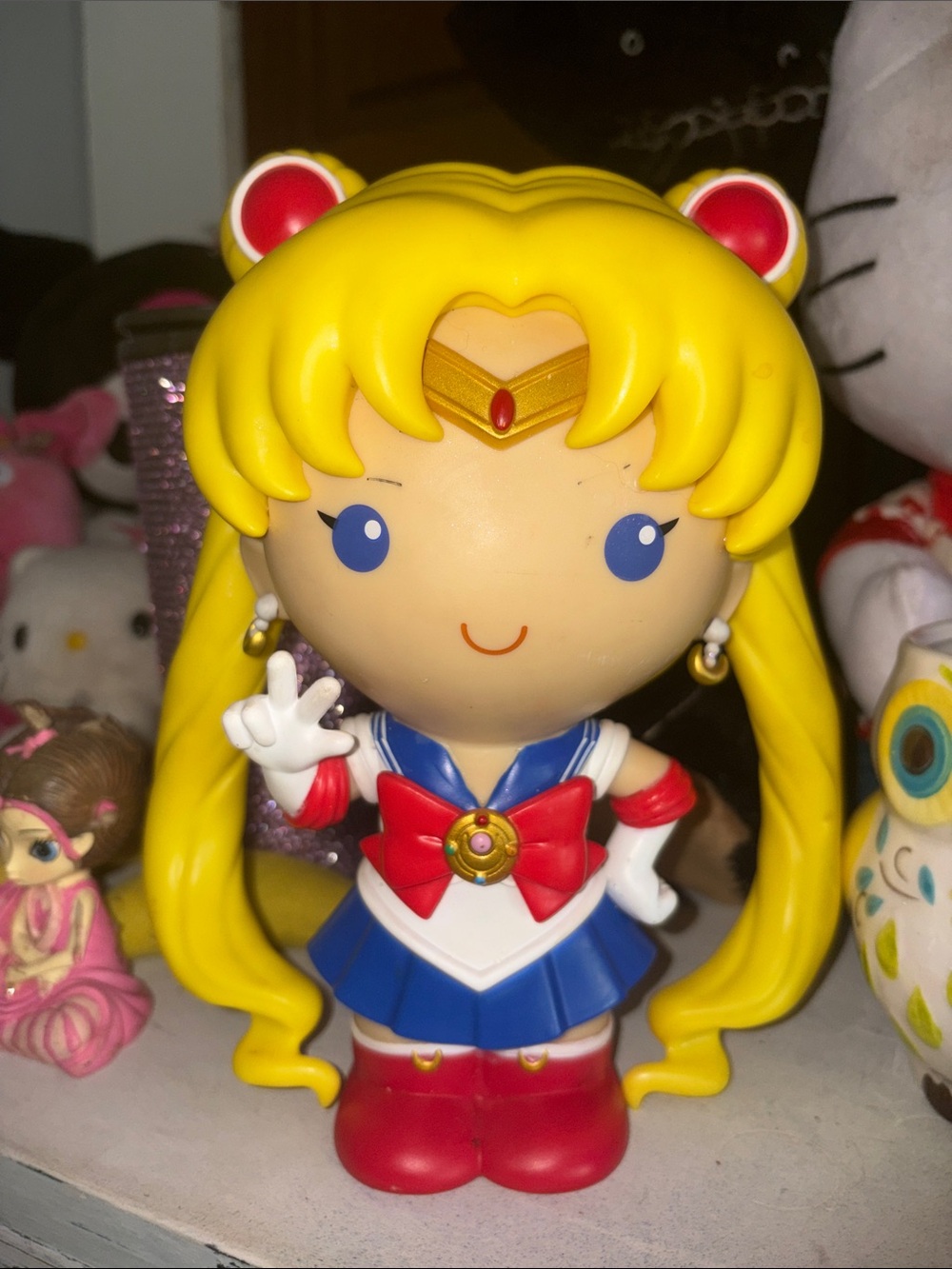 Collectible Doll with Yellow Hair and Blue Outfit - Sailor-Inspired Figurine